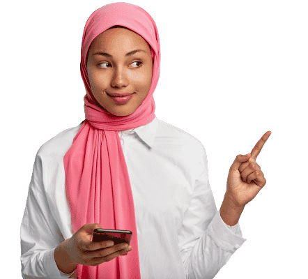 satisfied good looking female with dark skin holds cell phone chats with followers social networks points away fore finger demonstrates free space promotional content wears scarf head removebg preview e1645643437583